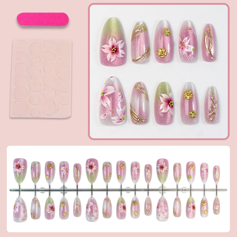 Artificial nails with floral design and gold accents Kalsten
