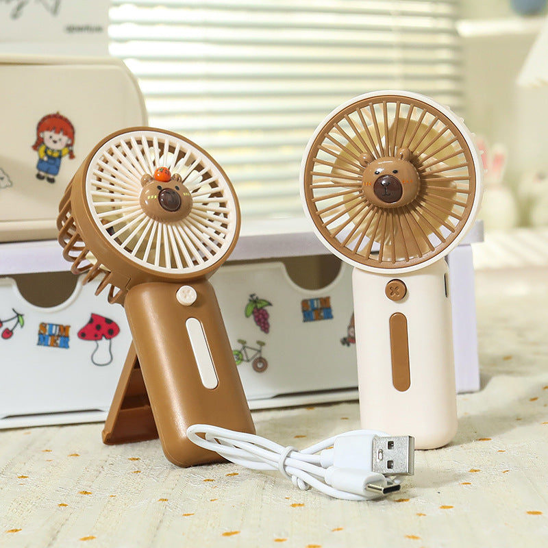 Unisex nano compact battery handheld fan with clip function and brushless whisper drive Kalsten
