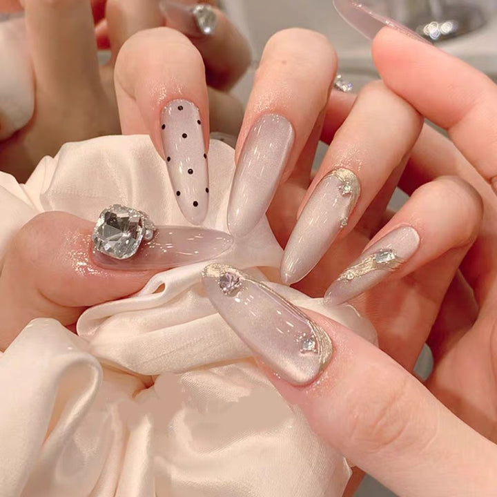 Decorative Stiletto Nail Art Extensions with Rhinestone Accents