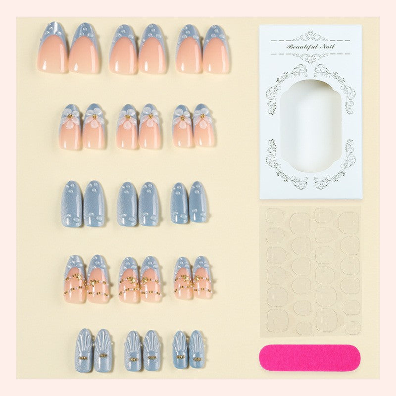 Creative acrylic nail set with elegant flower and glitter accents Kalsten