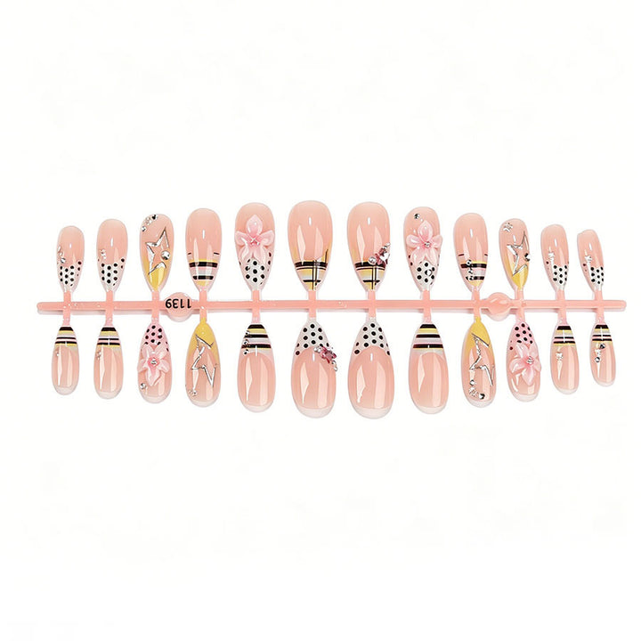 Artificial nail set with stylish floral accents and glitter details Kalsten