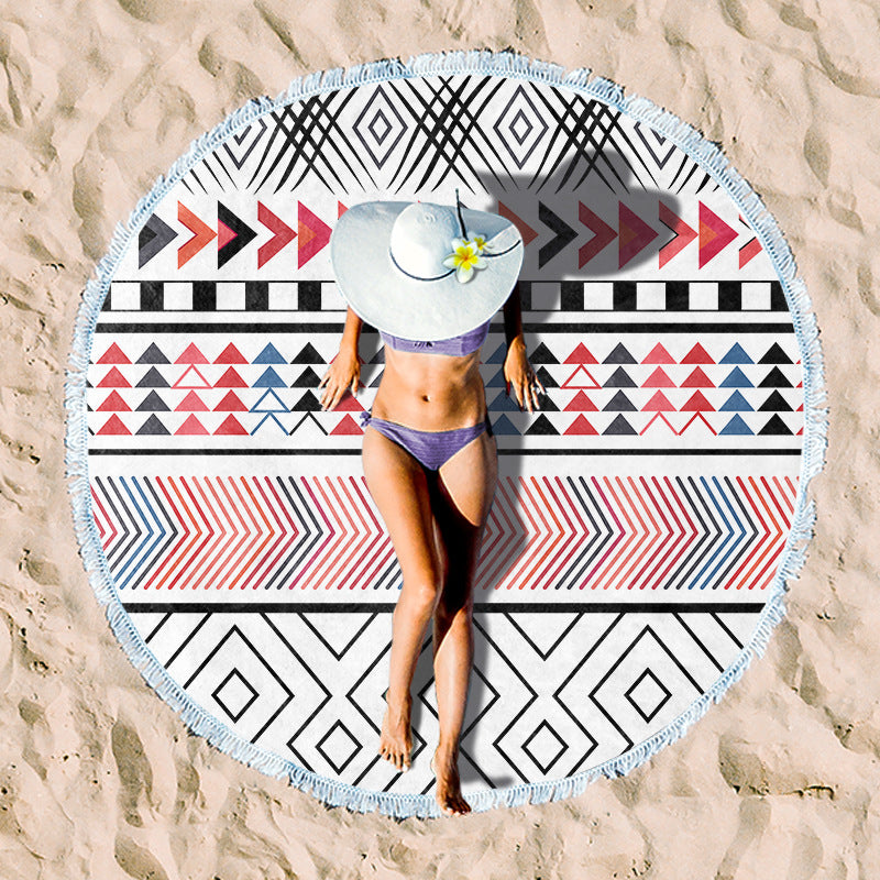 Round beach towel with vibrant tropical pattern Kalsten