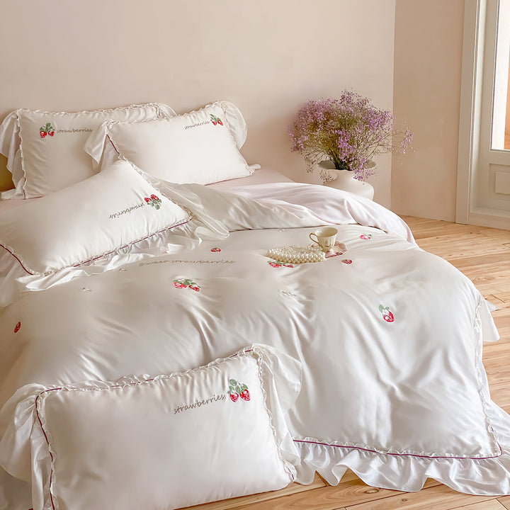 Romantic satin bedding set with strawberry embroidery and ruffles