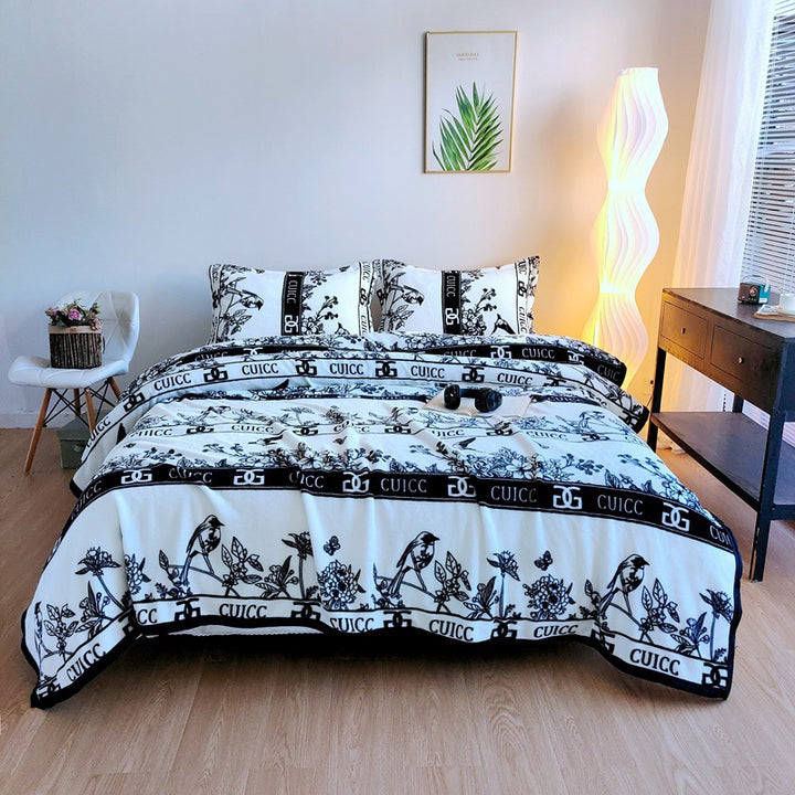 Women's cozy fleece blanket with playful cloud pattern Kalsten
