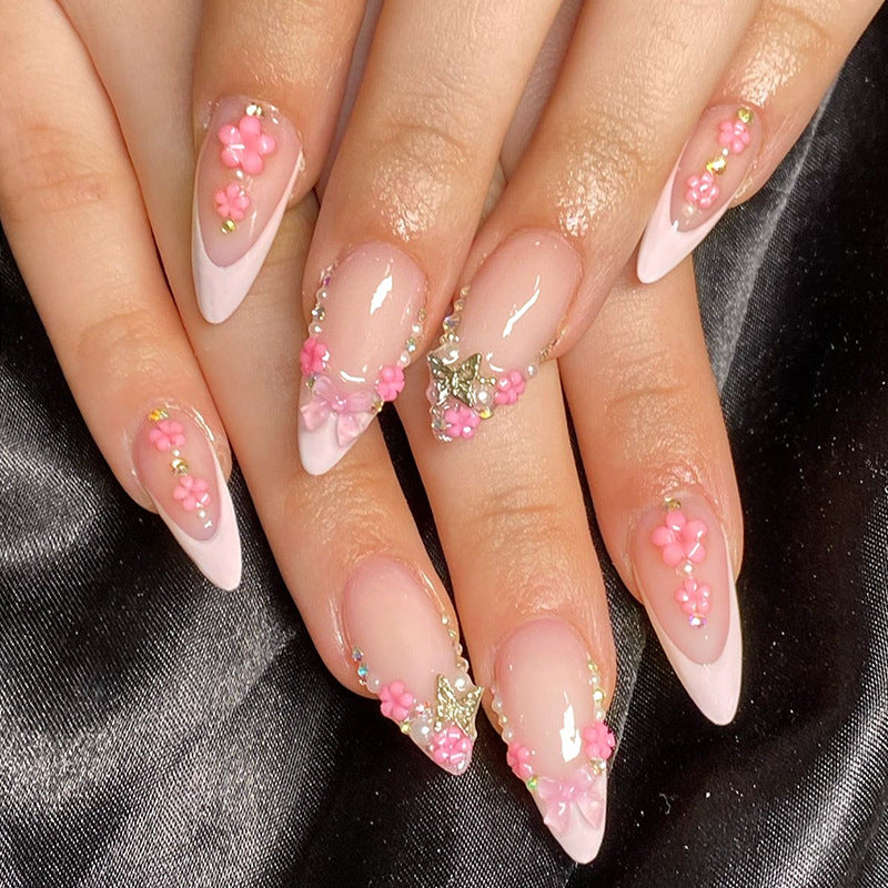 Creative nail art set with playful flower and glitter accents Kalsten