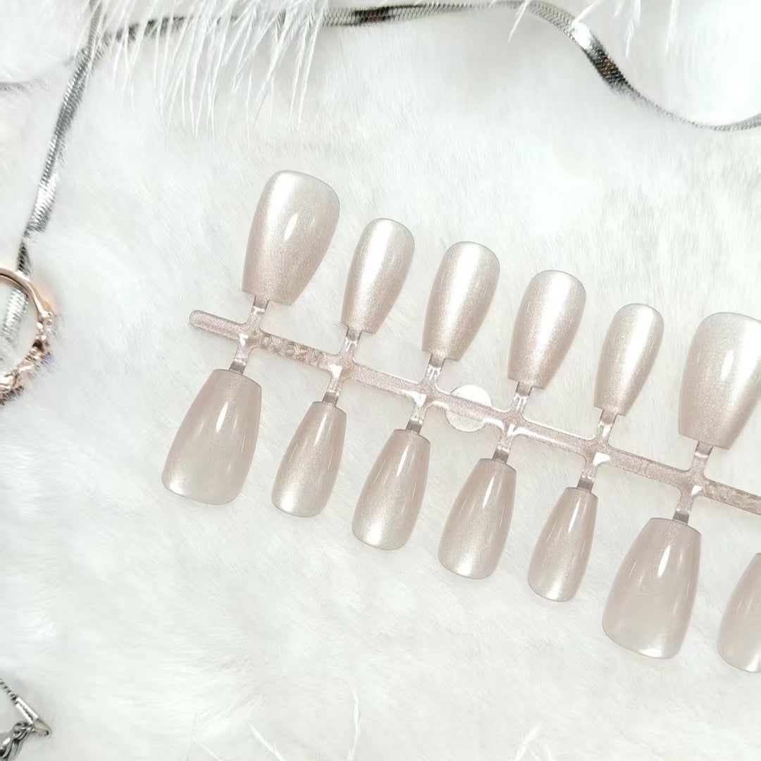 Artificial nails in elegant nude glitter design Kalsten