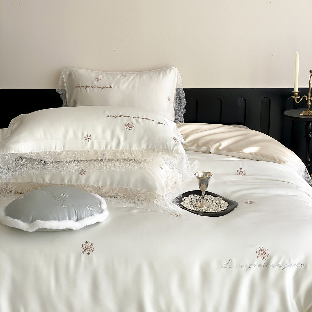 Luxurious satin bedding set with lace trim and snowflake embroidery