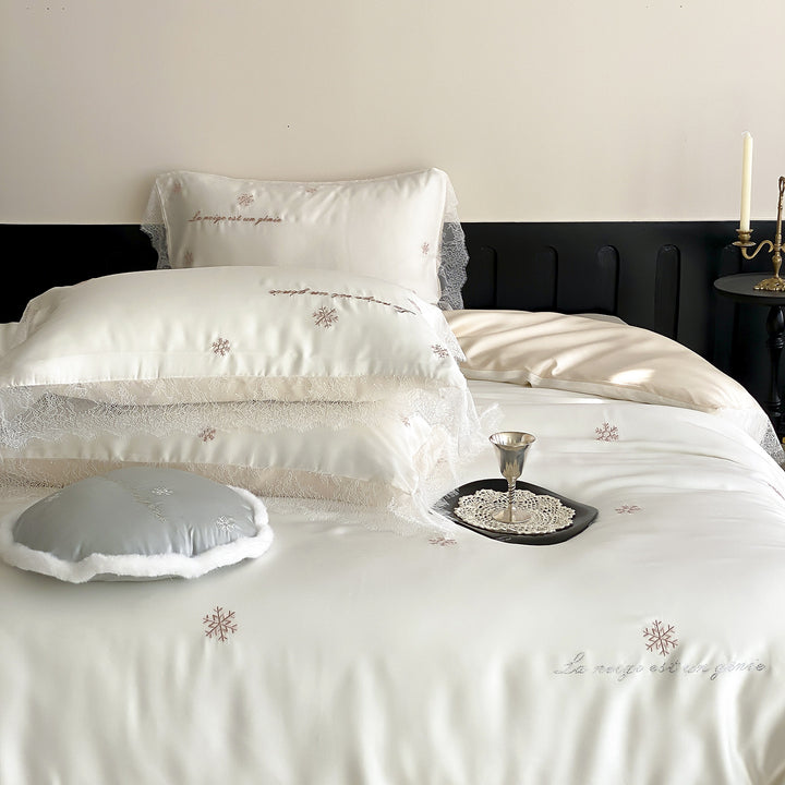 Luxurious satin bedding set with lace trim and snowflake embroidery