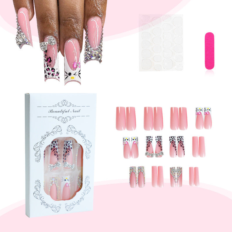 Glamorous artificial nail set with sparkling rhinestone embellishments and creative animal designs Kalsten