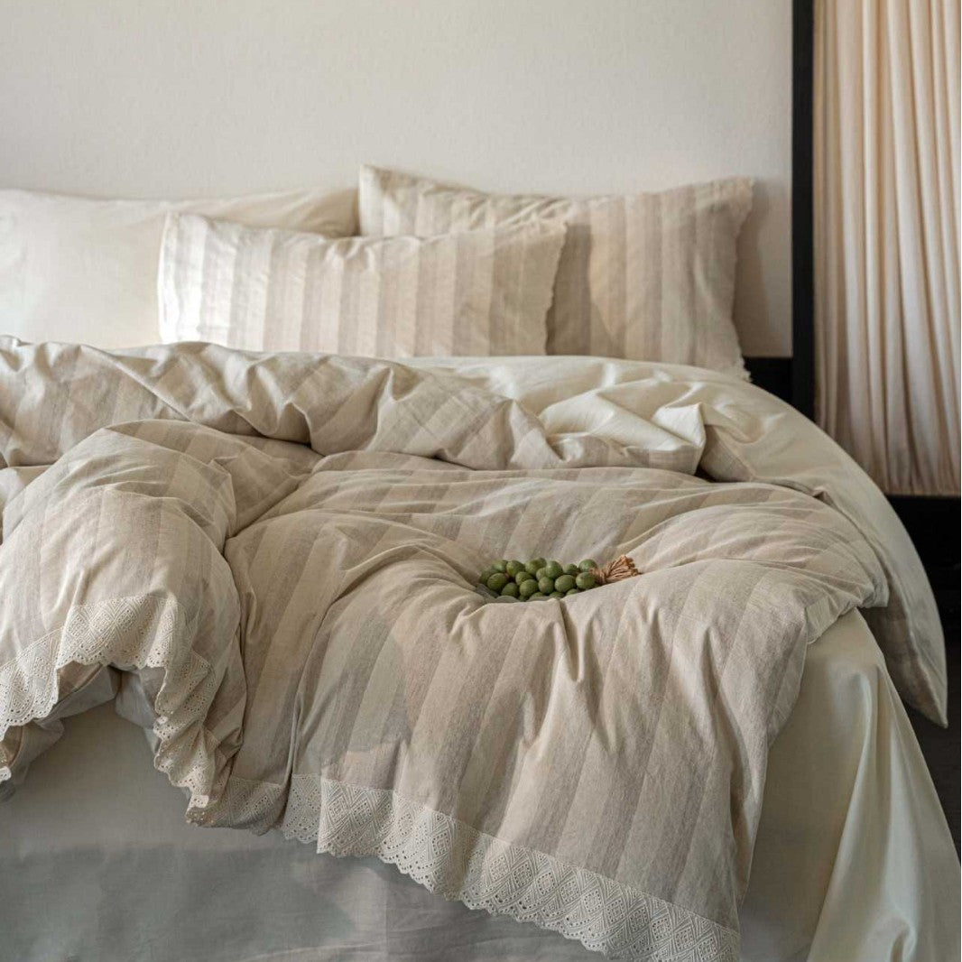 Bedding set with polka dot dobby texture and eyelet embroidery frill