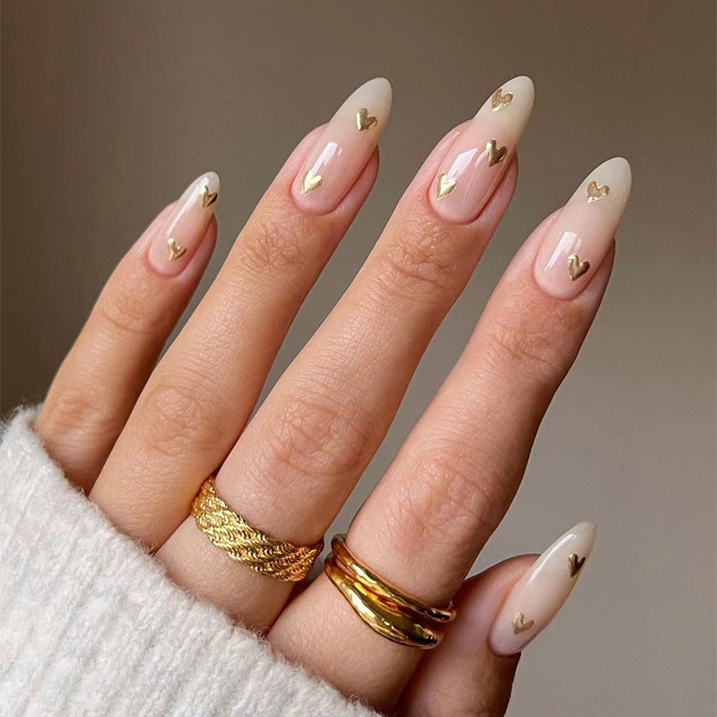 Artful Nail Art with Golden Heart Accents Kalsten