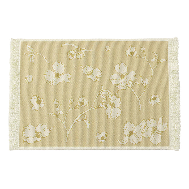 Woven table placemat made of cotton blend with olive branch print and decorative fringe edge