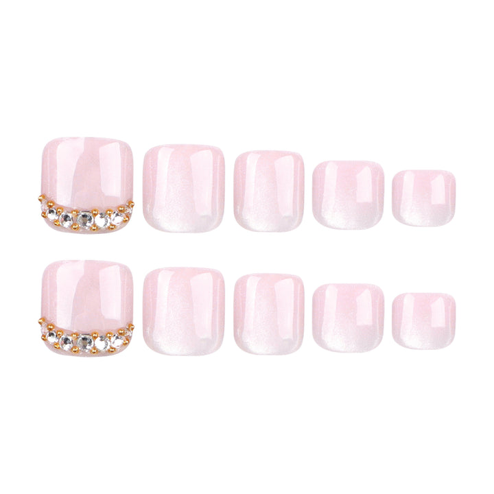 Artful toenail art with glitter and rhinestone decorations Kalsten