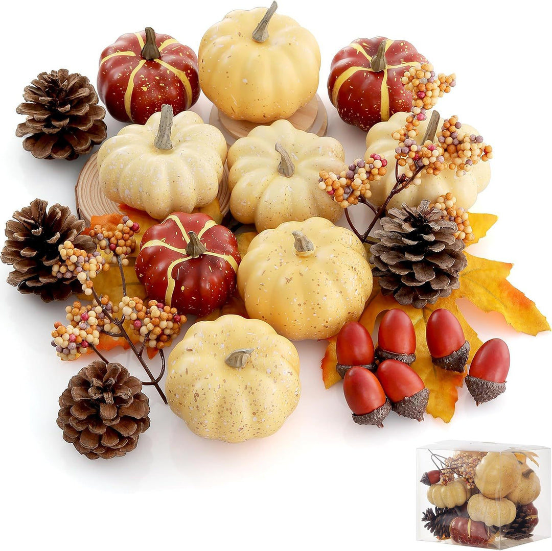 Autumn decorative set made of realistic artificial pumpkins, pine cones, acorns, and maple leaves