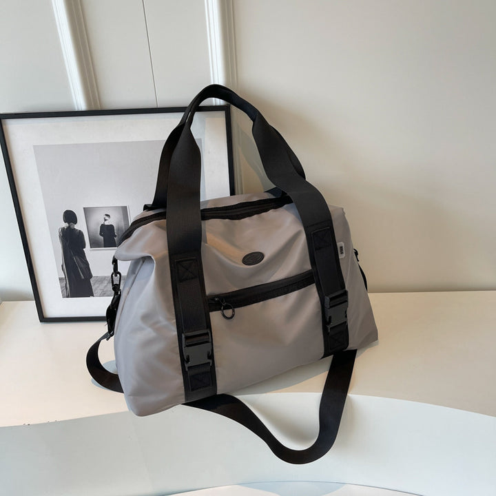 Spacious sports duffel bag with ergonomic carrying handles and water-repellent material Kalsten