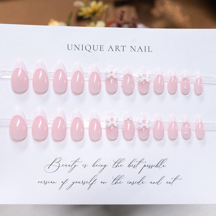 Decorative Press-On Nail Art with Bow Accents