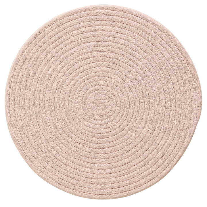 Round woven placemats made of cotton and jute rope with spiral pattern