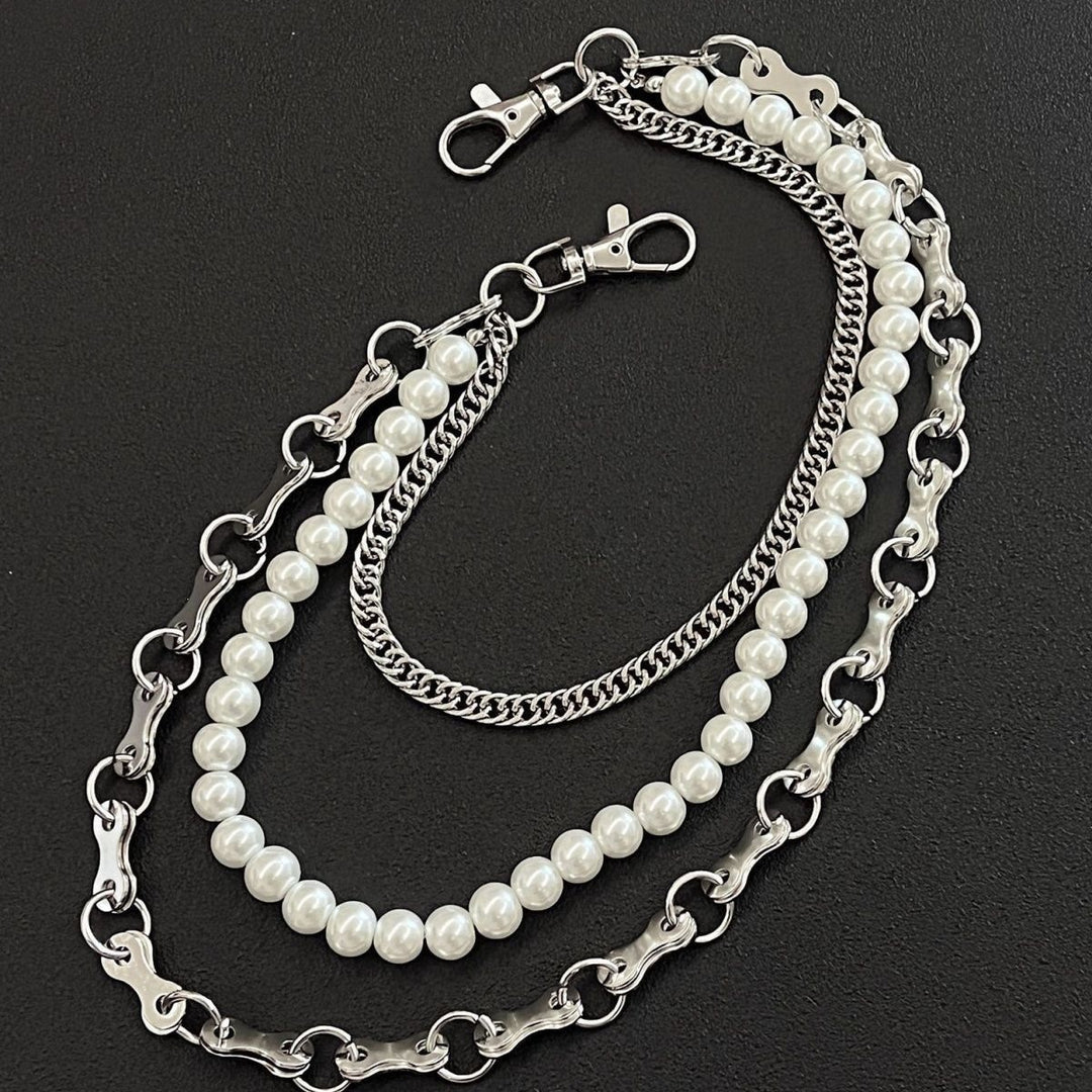 Fashionable chain bracelet with pearls and metal links Kalsten