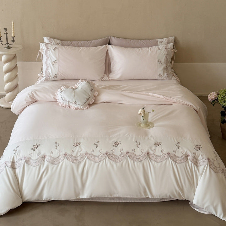 Luxurious embroidered satin bedding set with ruffled hem