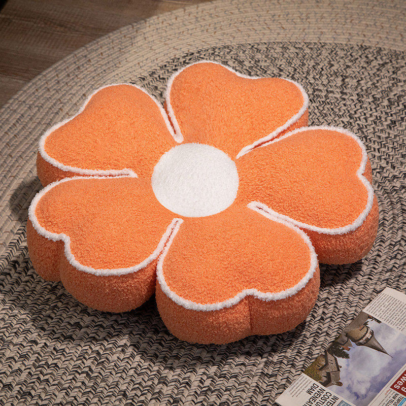 Padded seat cushion in flower shape with faux leather center piece and fluffy edge padding