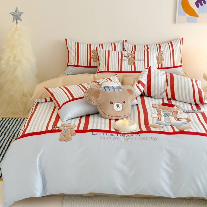 Children's bedding set with embroidered teddy bear design and fine stripes