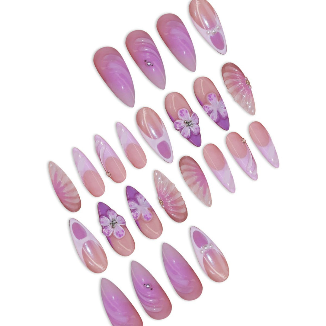 Artistic Stiletto Press-On Nail Art with Floral and Gemstone Accents Kalsten
