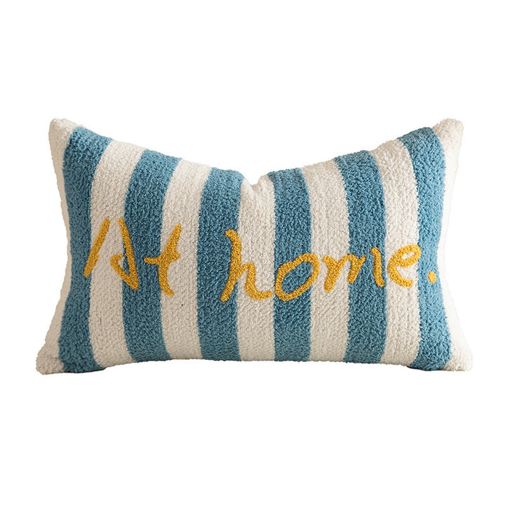 Striped bouclé decorative pillow with embroidered lettering and cuddly filling