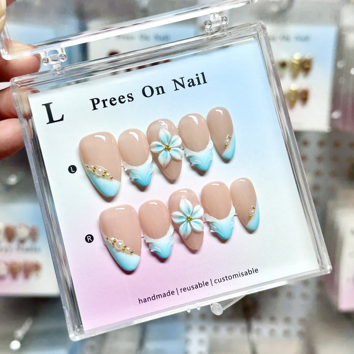 Artistic Press-On Nail Set with Floral and Green Accents