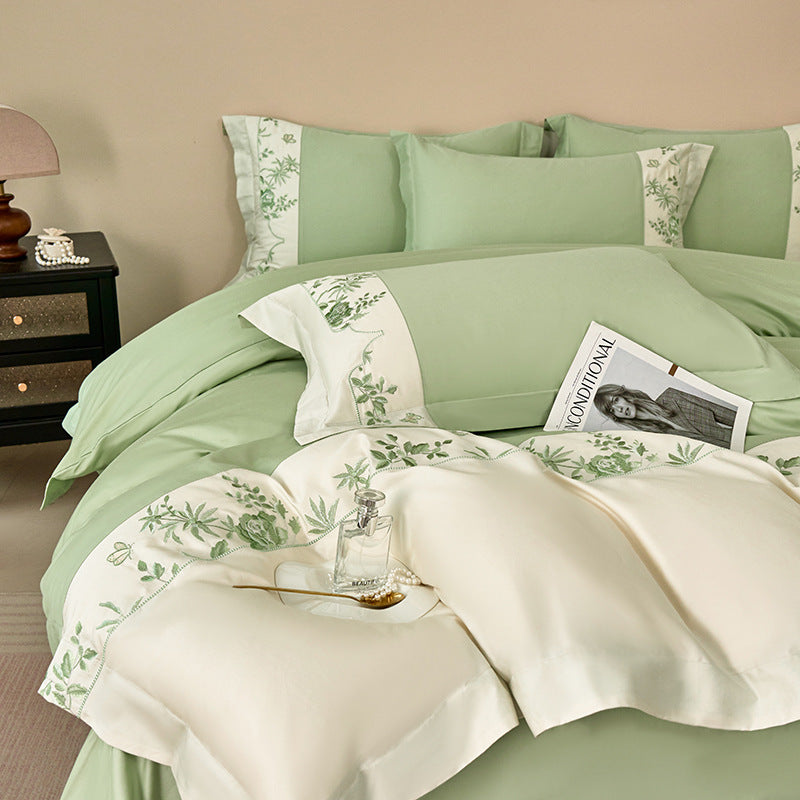 Luxurious bedding set with embroidered border and satin look