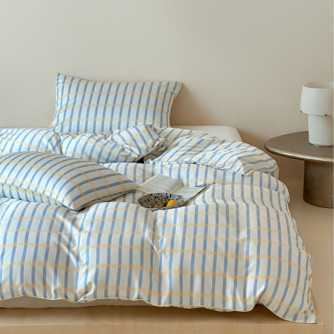 Soft cotton satin bedding with fine check and stripe pattern