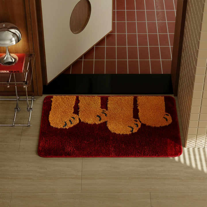 Fluffy bathroom doormat with paw relief