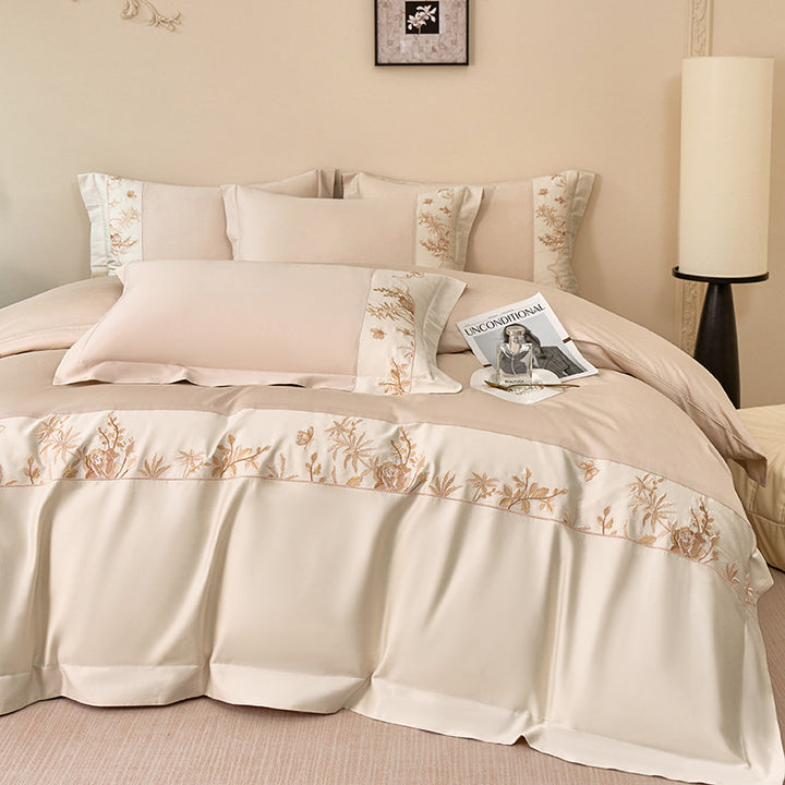 Luxurious bedding set with embroidered border and satin look