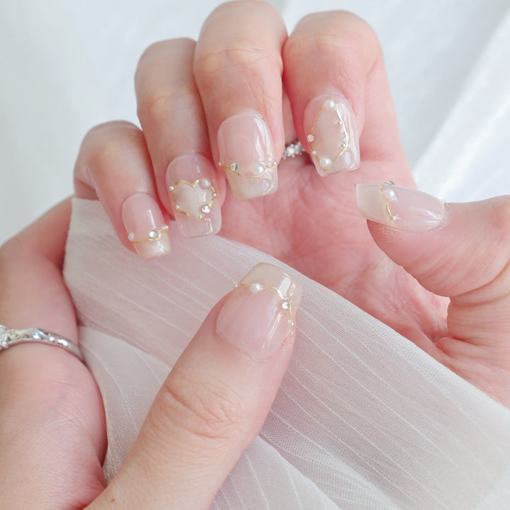 Artistic Press-On Nail Art Set with Heart and Celestial Designs