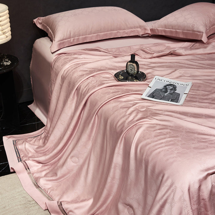 Luxurious quilted bedspread with satin jacquard and decorative border