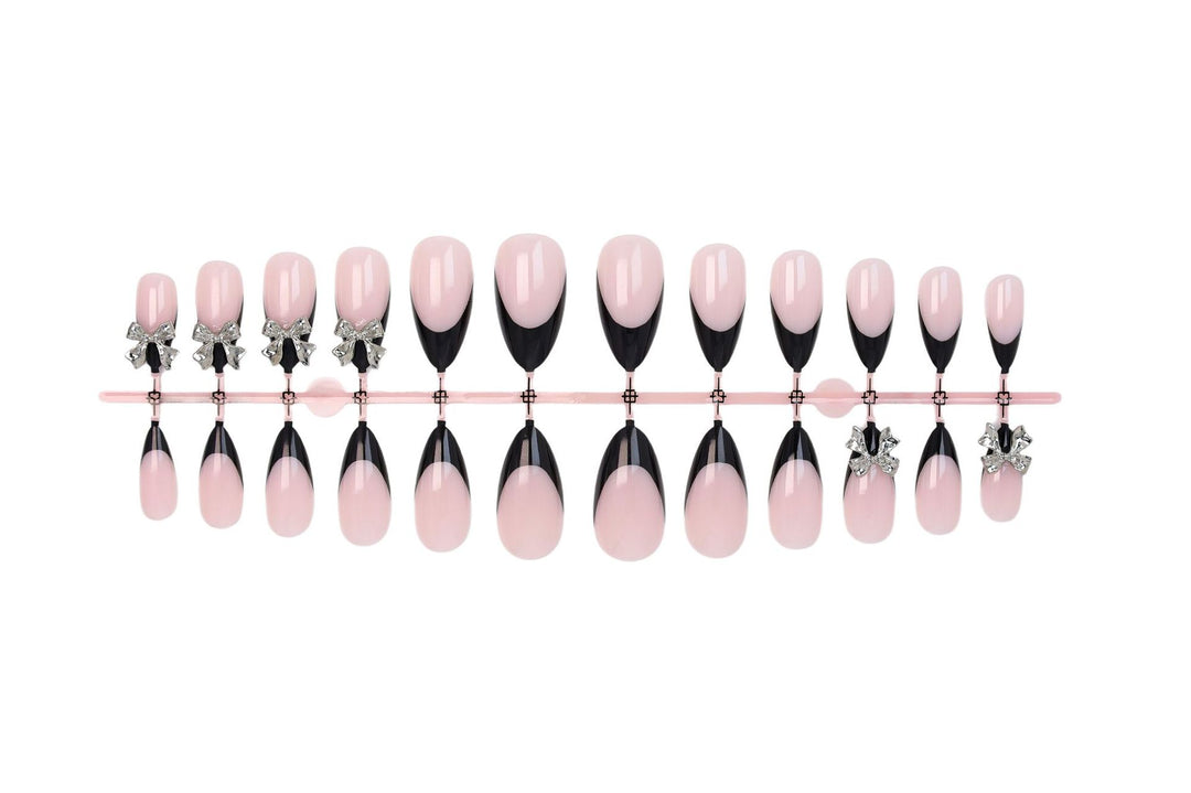 Nail art set with elegant tips and artistic embellishments Kalsten