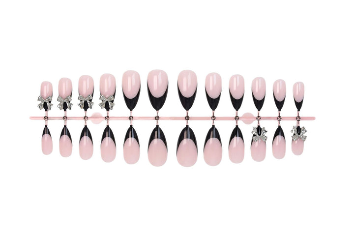 Nail art set with elegant tips and artistic embellishments Kalsten