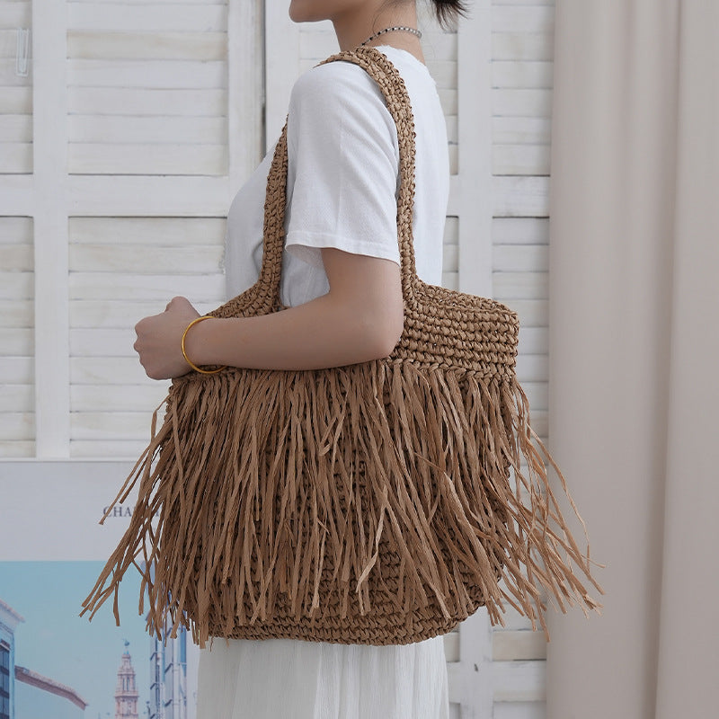 Trendy raffia bag with fringed details Kalsten