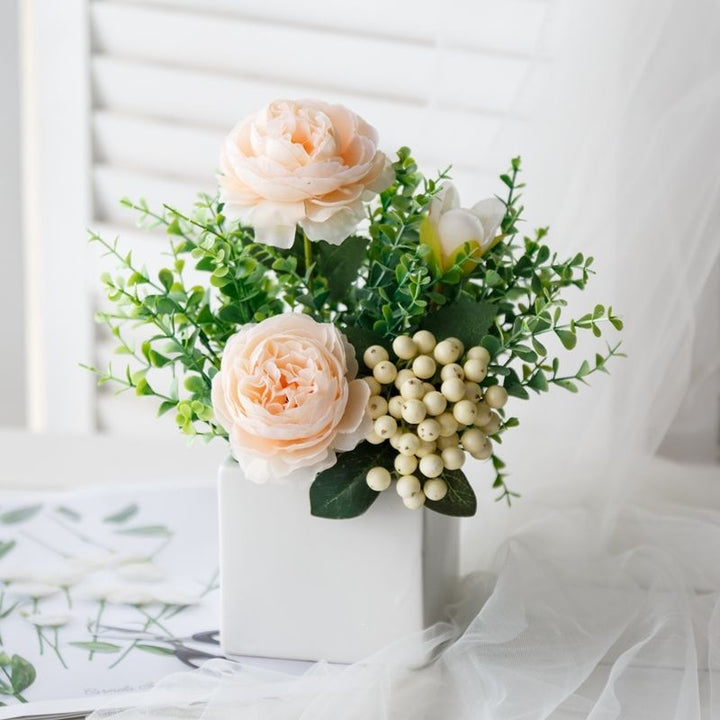 Lifelike Floral Arrangement in Decorative Square Planter