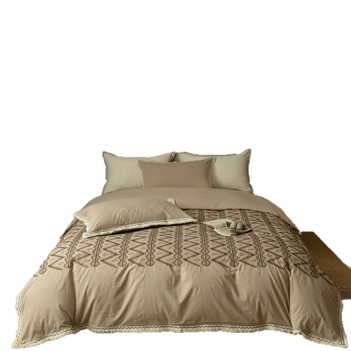 Premium cotton bedding set with woven ethnic overlay and fringes