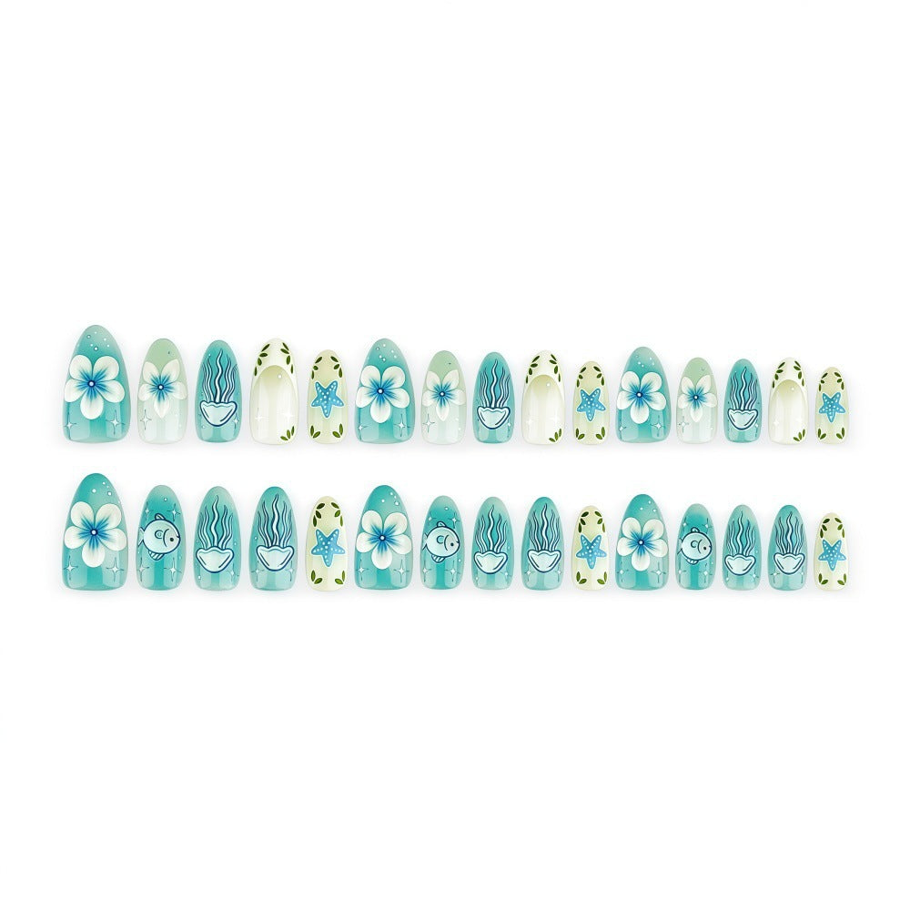 Artificial nails in a maritime design with colorful shell and water motifs Kalsten