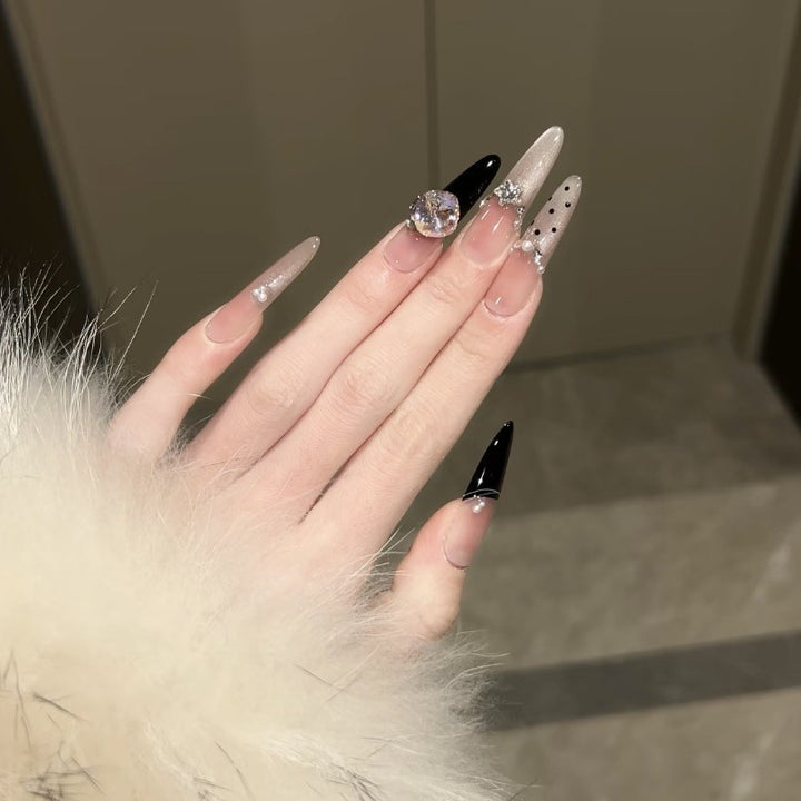 Artificial nails in elegant design with glittering decorations Kalsten