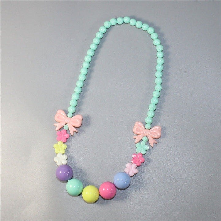 Colorful pearl necklace with floral elements Kalsten