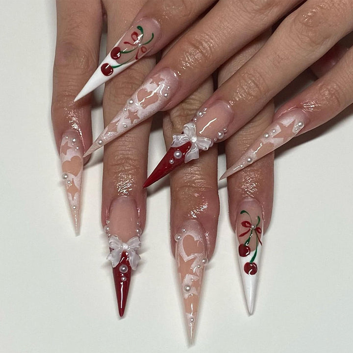 Artificial Nail Art with Festive Designs Kalsten