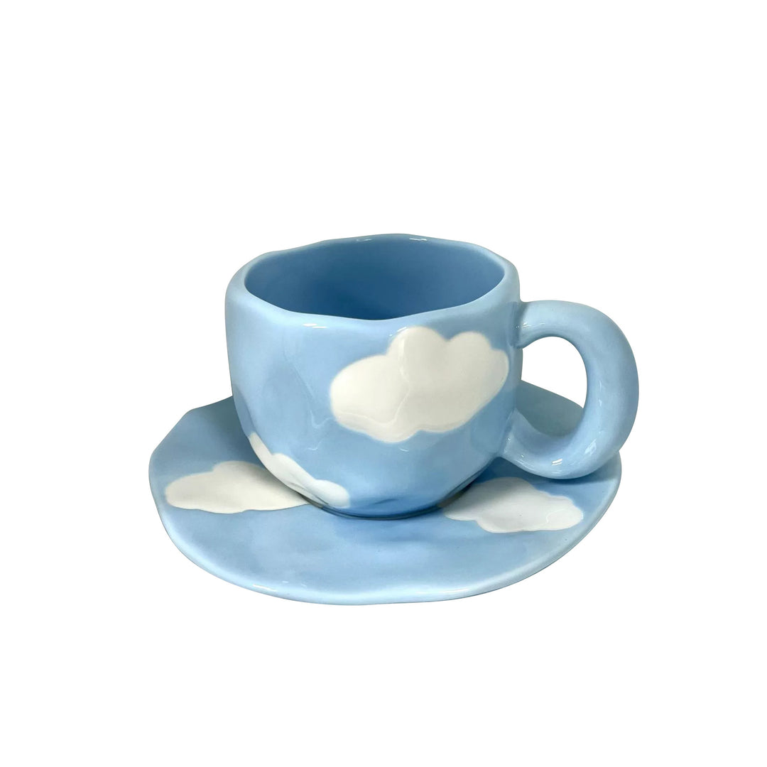 Ceramic mug with hand-painted tulip pattern and organic shape