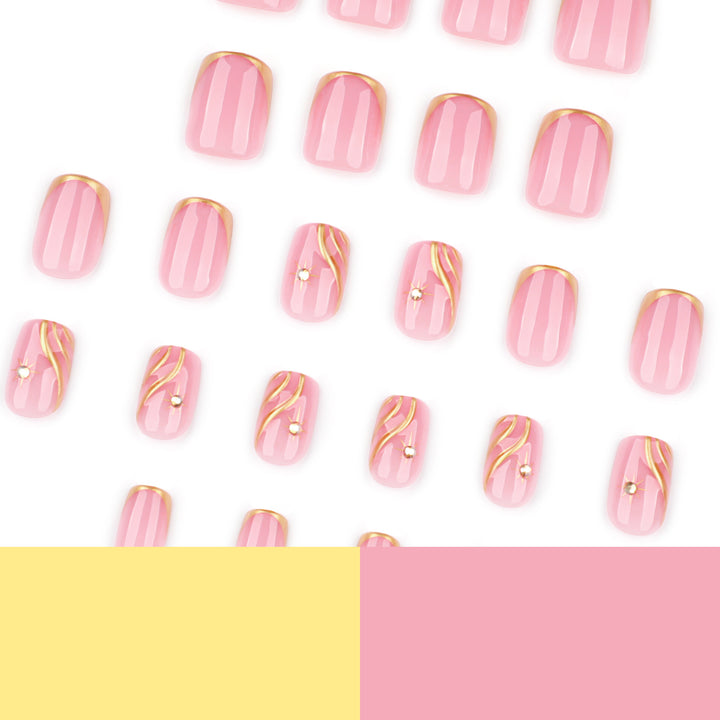 Artificial nail art with glamorous golden accents Kalsten