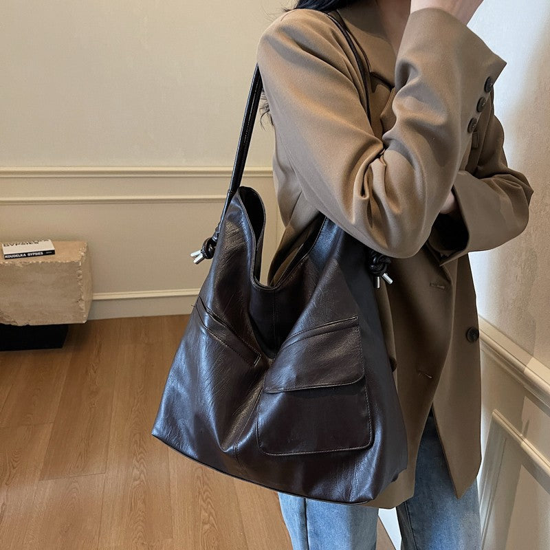 Casual tote bag with practical front pockets Kalsten