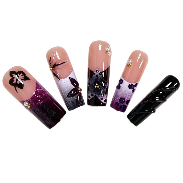 Artistic Long Nail Design with Floral Accents Kalsten
