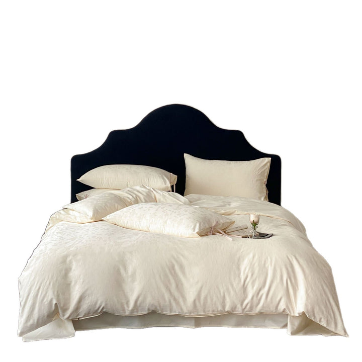 Jacquard bedding set with bow closure and fine floral texture