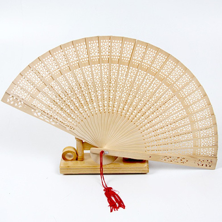 Ladies fan made of delicate plastic with artistic cut pattern Kalsten