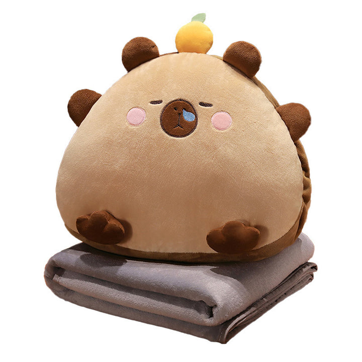 Plush cuddle pillow with integrated microfiber throw blanket in cute animal design